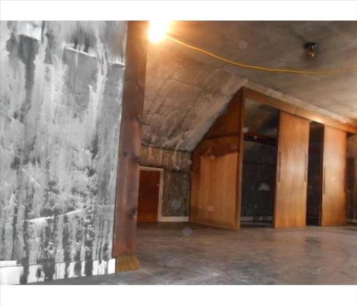 sooty walls and ceiling in loft