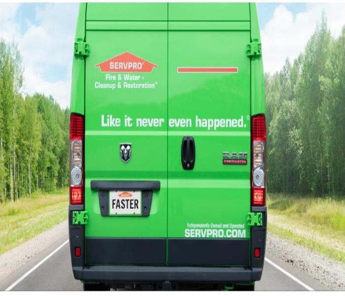 green ram van with why SERVPRO writing on back 