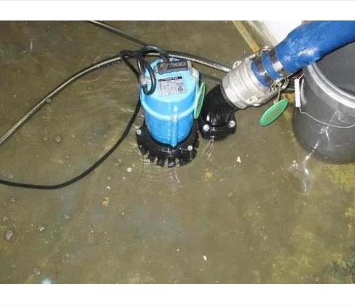 submerible pump at basement step access
